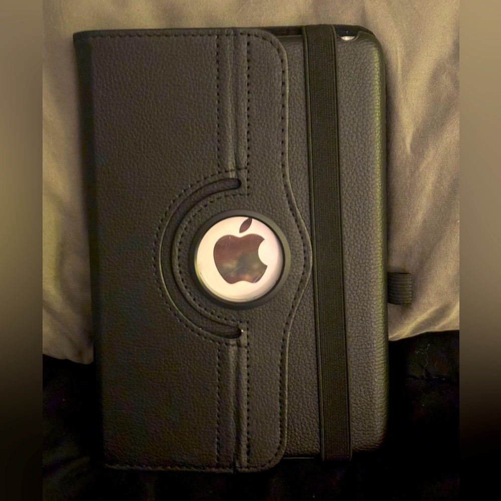 iPad mini with case and protector screen on